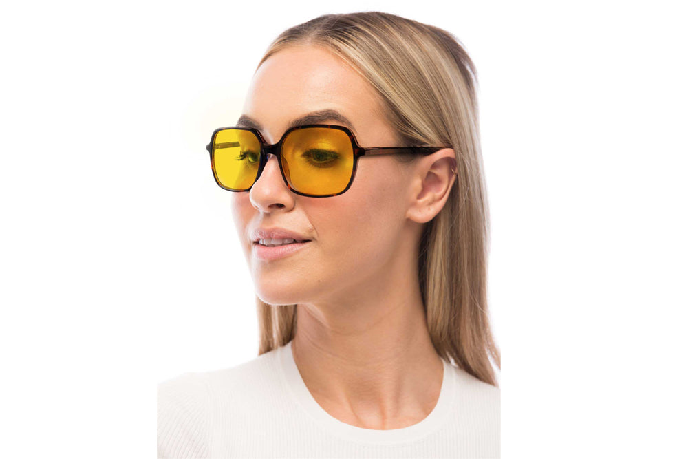 Woman Wearing Blaire Light Sensitivity Readers